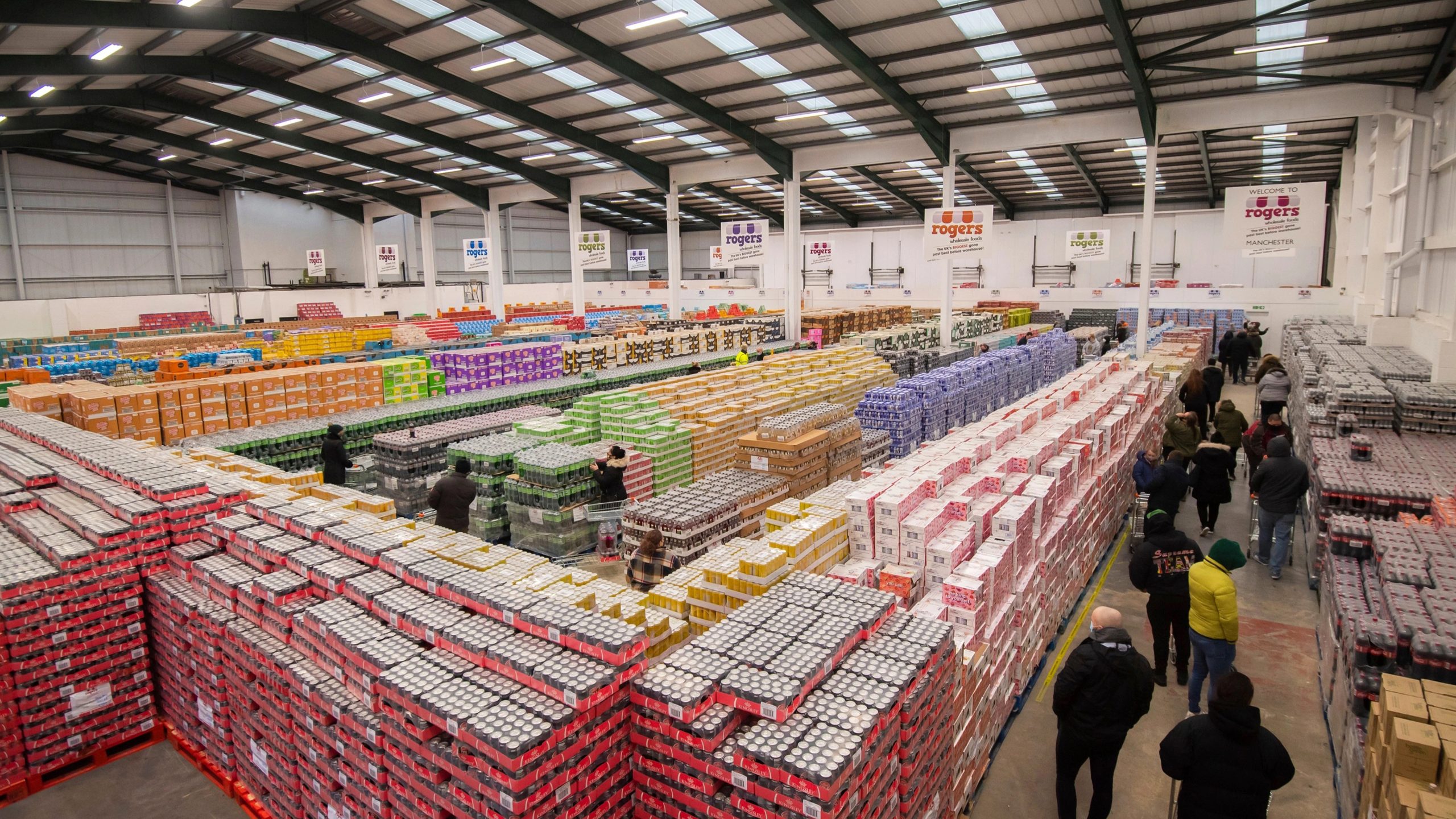 warehouse full of staff and stock